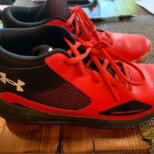 Pair of Boys Size 5 Under Armour UA basketball shoes.